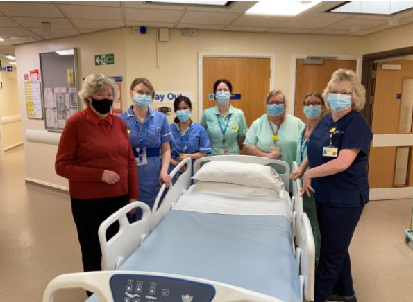 Totnes Hospital League of Friends chairwoman Allison Davey (left) with the Totnes Hospital nursing team and deputy matron, Allie Taylor (right).