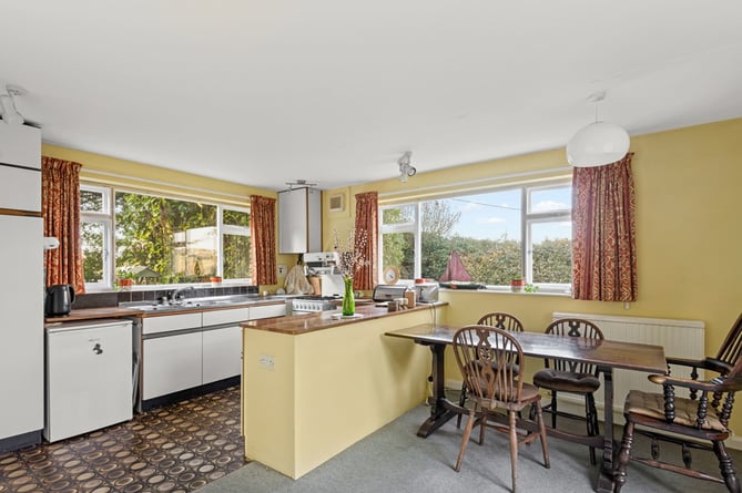 Original brown lino flooring in the kitchen of the 1970s house in Salcombe, Devon. See SWNS story SWLNhouse. An incredible 'time warp' 1970s home with original patterned wallpaper, lino and apricot tiles has gone on the market - for Â£1million. The four bedroom property was originally built in the seventies and has been with the same owners for almost 40 years. The house is described as being "ready for modernisation" but some 70s fans may want to leave the decor exactly as it is.