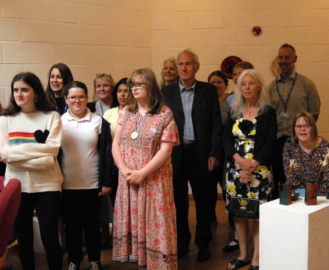 Students celebrate opening of art exhibition in Totnes