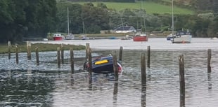 Two rescued as car’s engulfed by incoming tide