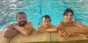 Dad and sons complete swim challenge