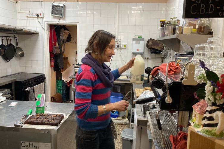 Owner Andrea Goring makes a cappuccino