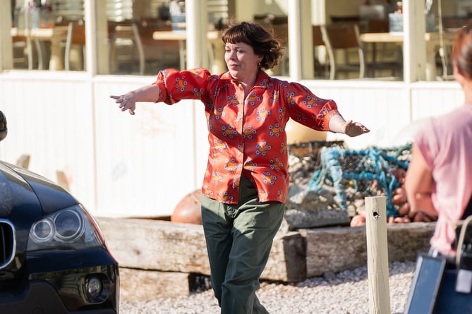 Olivia Colman on set for 'The Roses' in Salcombe, Devon. Photo released June 11 2024. Benedict Cumberbatch and Olivia Colman are said to be coming to North Sands Beach in Salcombe preparing to film for âThe Rosesâ which is a new Netflix version of the 1989 black comedy âThe War of the Rosesâ. The film is based on Warren Adler's 1981 novel, and will be adapted by Poor Things scribe Tony McNamara.