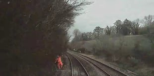 Rail worker missed oncoming train by two seconds, report says 