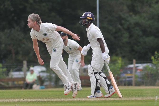 Devon Cricket League Premier Division.  Bovey Tracey versus Bradninch & Kentisbeare. Bradninch bowler Mitchell Pugh and Bovey batsman Musa Twala