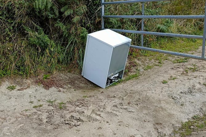 A dumped fridge in a farm in the South Hams