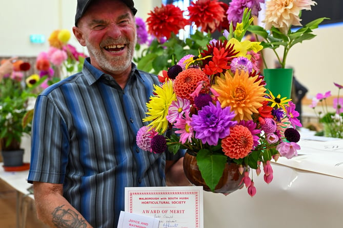 Bob Gould and his blue ribbon flowers