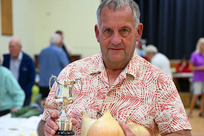 Mike Hine with his cup winning onions