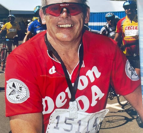 Robin cycling the Argus race in South Africa in 2002