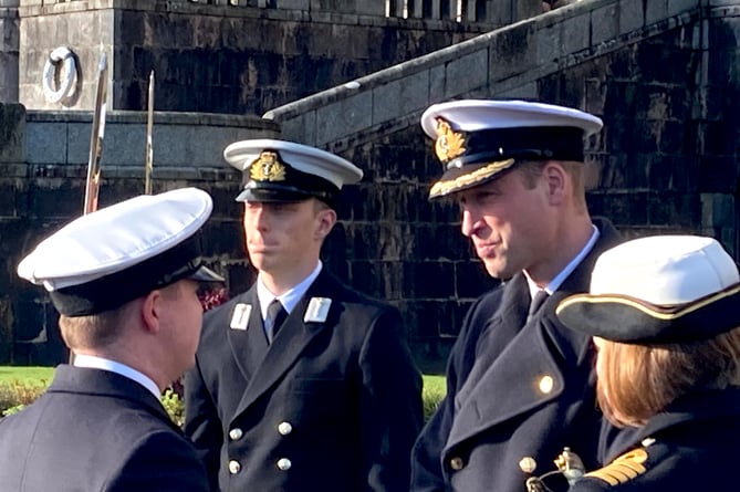 Prince William chatting to the officer recruits during their passing out ceremony at Dartmouth's Naval College in December 2023