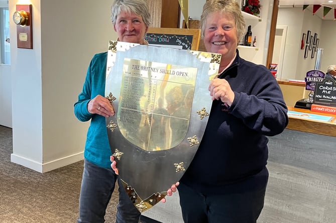 Ladies competition winner Liz Sharman and lady captain Pam Adams with the magnificent (and heavy) Britney Shield