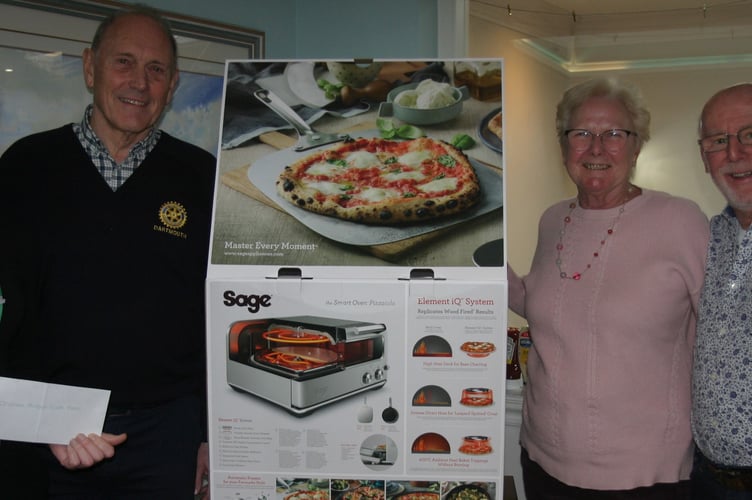 Pictured: Hospice representatives Daniela Hopkins (left) and Sue Tweed with Dartmouth Rotarians Bernard Young and Keith Barker (right).