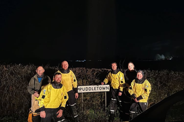 Members of a rescue team in Puddletown