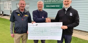 Bigbury men’s captain hands over cheque to RNLI